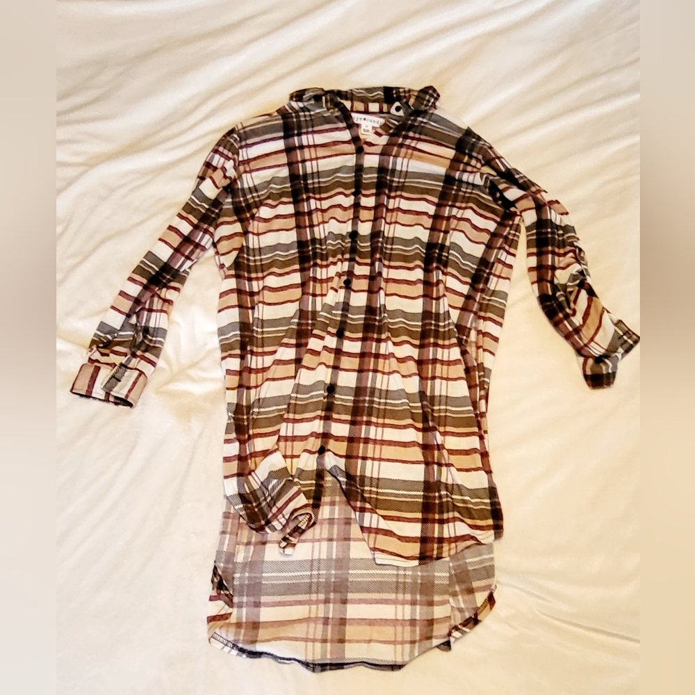Long flannel shirt, open side flares, maroon, black, tan colors.